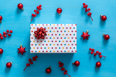 Christmas wooden background with red christmas tree toys and ballsの写真素材