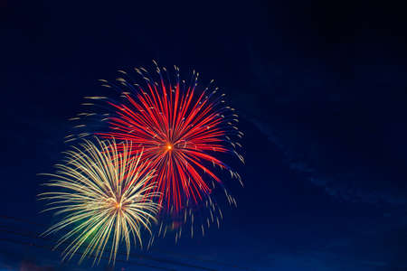 Fireworks on the background of the dark night sky. 4th July - American Independence Dayの写真素材