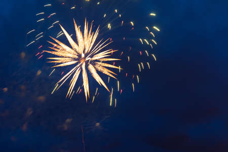 Brightly colorful fireworks and salute of various colors in the night sky. Independence Day, 4th of July, Fourth of July or New Year.の写真素材
