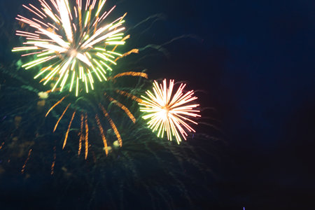 Brightly colorful fireworks and salute of various colors in the night sky. Independence Day, 4th of July, Fourth of July or New Year.の写真素材