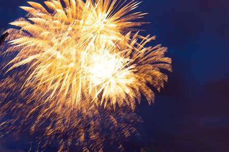 Brightly colorful fireworks and salute of various colors in the night sky. Independence Day, 4th of July, Fourth of July or New Year.の写真素材
