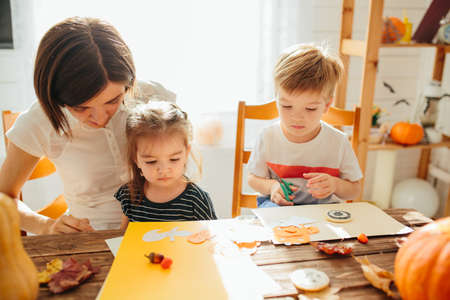Mothers And Children Making Halloween Lanterns Happy Halloween conceptの写真素材