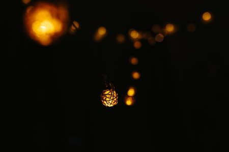 Christmas lights on dark background. Ball shaped.の写真素材