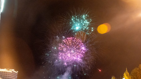 Fireworks against the dark sky. Celebrating New Year or Independence Dayの写真素材