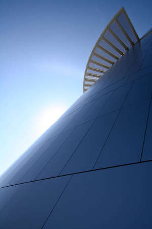 Sunlight behind stairs on blue buildingのeditorial素材