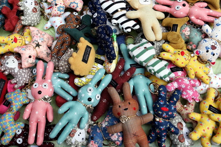A pile of homemade key ring stuffed toysの写真素材