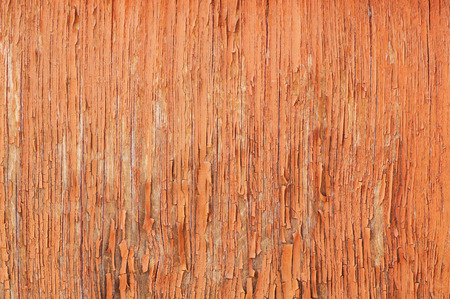 Abstract background old cracked oil painted brown wooden board surfaceの写真素材