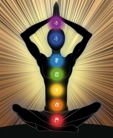 Man silhouette in yoga position with the symbols of seven chakras の写真素材