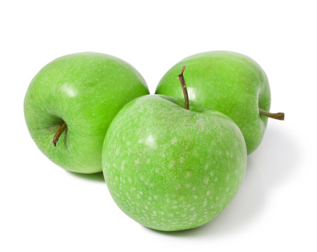 Green apples on a white backgroundの写真素材