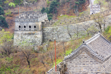 The great wall of China, with a beautiful mountain.