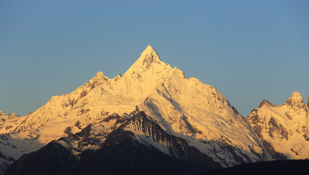 sunrise of snow mountain,China,Tibetの写真素材