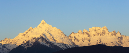 sunrise of snow mountain,China,Tibetの写真素材