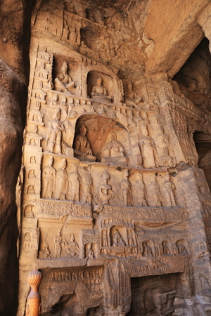 Buddha in the rock cave の写真素材