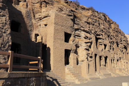 Buddha in the rock cave の写真素材