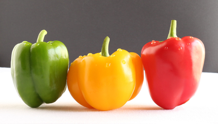 Green, yellow and red peppers, organic type and fresh, which are said to offer many health benefits.の写真素材