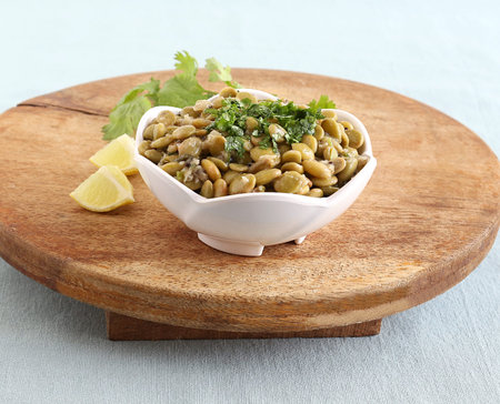 Avarekai palya or hyacinth beans curry, a home cooked south Indian vegetarian side dish, in a bowl...
