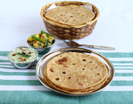 Chapati or Indian flat bread, which is a traditional and popular vegetarian breakfast or lunch item,...