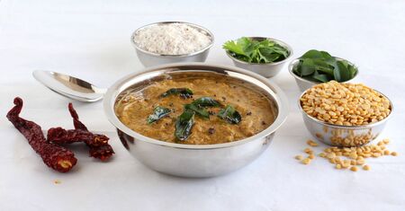 Toor dal chutney, an Indian, delicious vegetarian side dish is made from items like split pigeon pea and dry coconut, is a side dish for items like idli, dosa, chapati, and roti, with some of its main ingredients.の写真素材