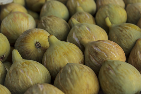 fresh ripe figs in the box ready for sale on marketplaceの写真素材