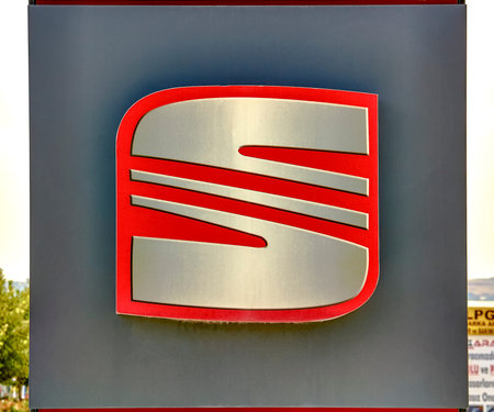 SEAT dealership sign in front of the showroom. SEAT is a Spanish automobile manufacturer and part of...