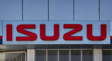 Isuzu dealership sign. Isuzu is a Japanese commercial vehicles and diesel engine manufacturing company headquartered in Tokyo.のeditorial素材