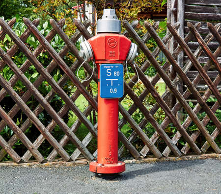 Red fire hydrant available of firefighters to tame the firesのeditorial素材