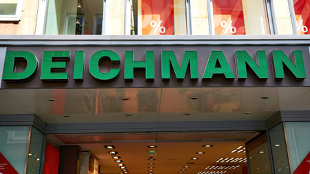 Deichmann logo on wall. Deichmann is a major German shoe and sportswear retail chain