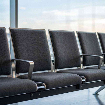 Waiting room at the airport. Departure hall with chairs