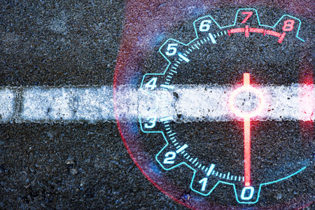 Speedometer car on black road textured background