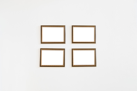 Picture frame wooden four on cement wallの写真素材