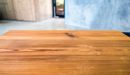 Wood table top on blurred mortar roomの写真素材