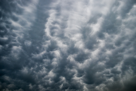 Darkness overcast cloud wave fluffy backgroundの写真素材