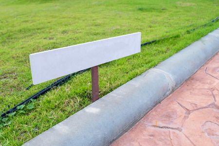 Signs blank side on grass fieldの写真素材