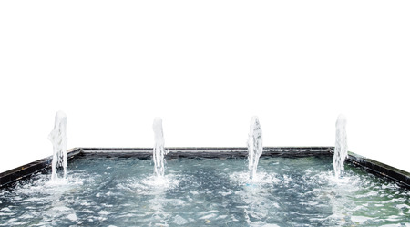 Fountain water spout spray in luxury basin on white backgroundの写真素材
