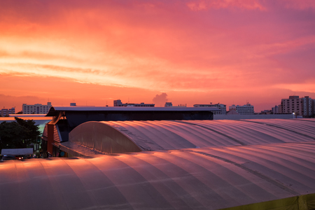 Sunset twilight on roof building cityの写真素材