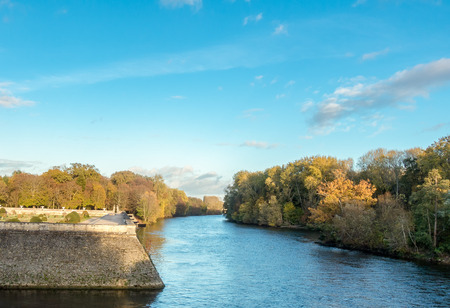 River bank seine and forest in autumnの写真素材
