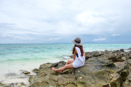 Young woman relaxing enjoy on tropical beach in bamboo islandの写真素材