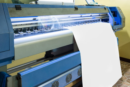 Large inkjet printer head working on white blank vinyl banner