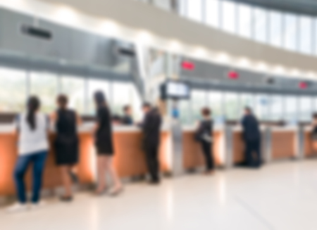 Blurred customer transaction in bank counter backgroundの写真素材