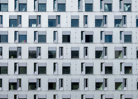 Pattern glass windows on residence building background