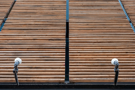 Modern wooden brown lath with lamp decoration on facadeの写真素材