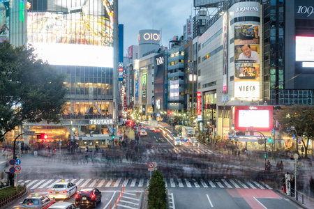 Tokyo, Japan - Nov 08 2017 : Pedestrians walking across with crowded traffic at Shibuya crossing squareのeditorial素材