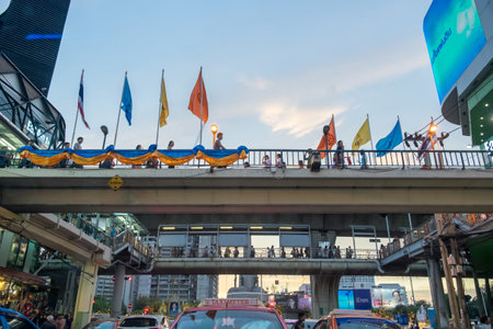 Bangkok,Thailand - Aug 10 2015 : Salary man and worker walking on bridge at center victory monumentのeditorial素材