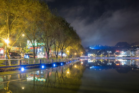 Sapa, Vietnam : Sep 07 2017 : Viewpoint lagoon decorated beautiful lights with willows tree in Sapa city, Vietnamのeditorial素材