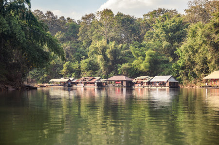 Tropical wooden raft building on river kwai in tropical rainforest at Kanchanaburiのeditorial素材