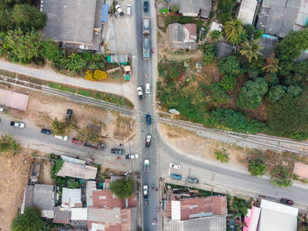 View of Cars with traffic on railway crossroad in countrysideのeditorial素材