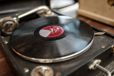 Obsolete retro vinyl record disk player in old box
