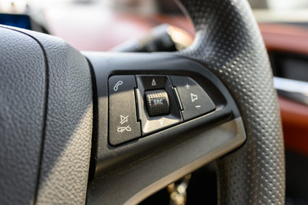 Steering wheel with sound and music control button