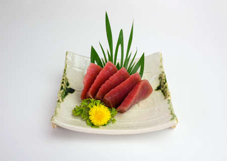 Japanese roll salmon cheese smoked with vegetable filled set on ceramic dishの写真素材