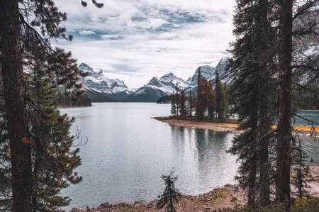 Canadian rockies with blue sky reflection on Maligne lake in Jasper, Canadaの写真素材